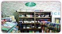 Faux Stone Wallpaper Takes a Convenience Store Wine Display to the Next Level